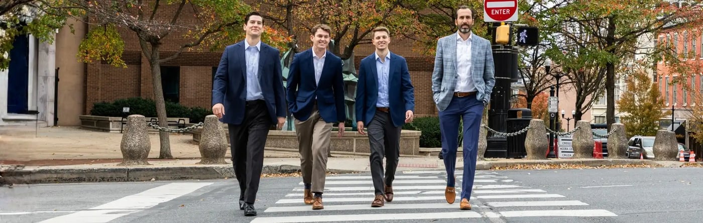 four Trout Capital Advisors walking downtown