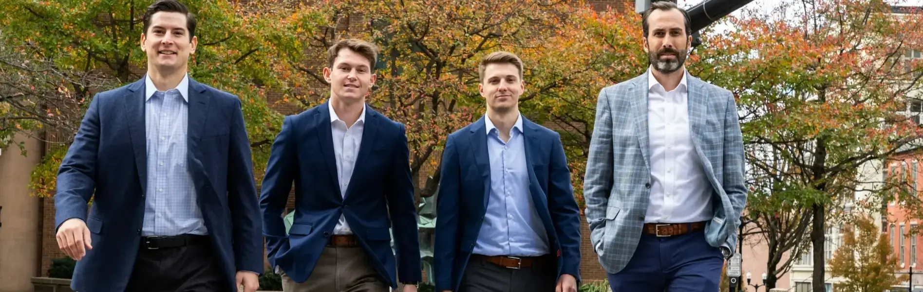 four Trout Capital Advisors walking downtown